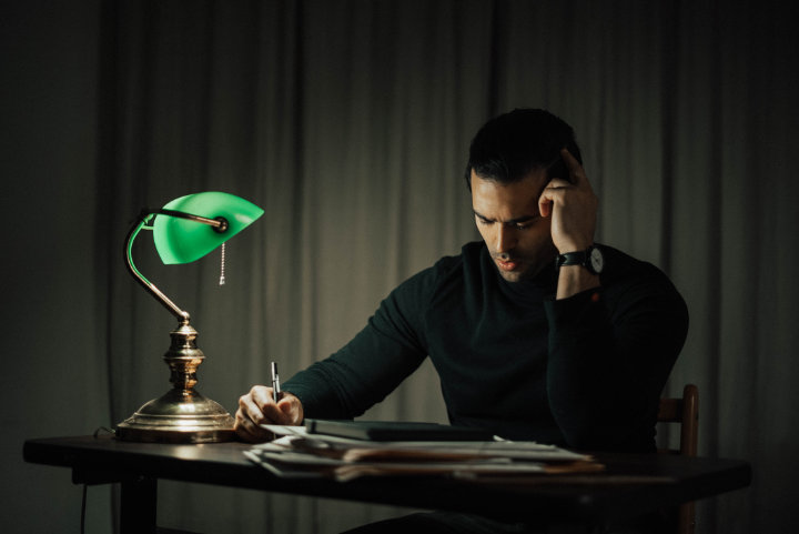 man working hard at night